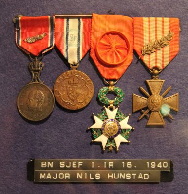 Medaljer tilhÃ¸rende Nils Hunstad / Krigsmuseet Narvik
